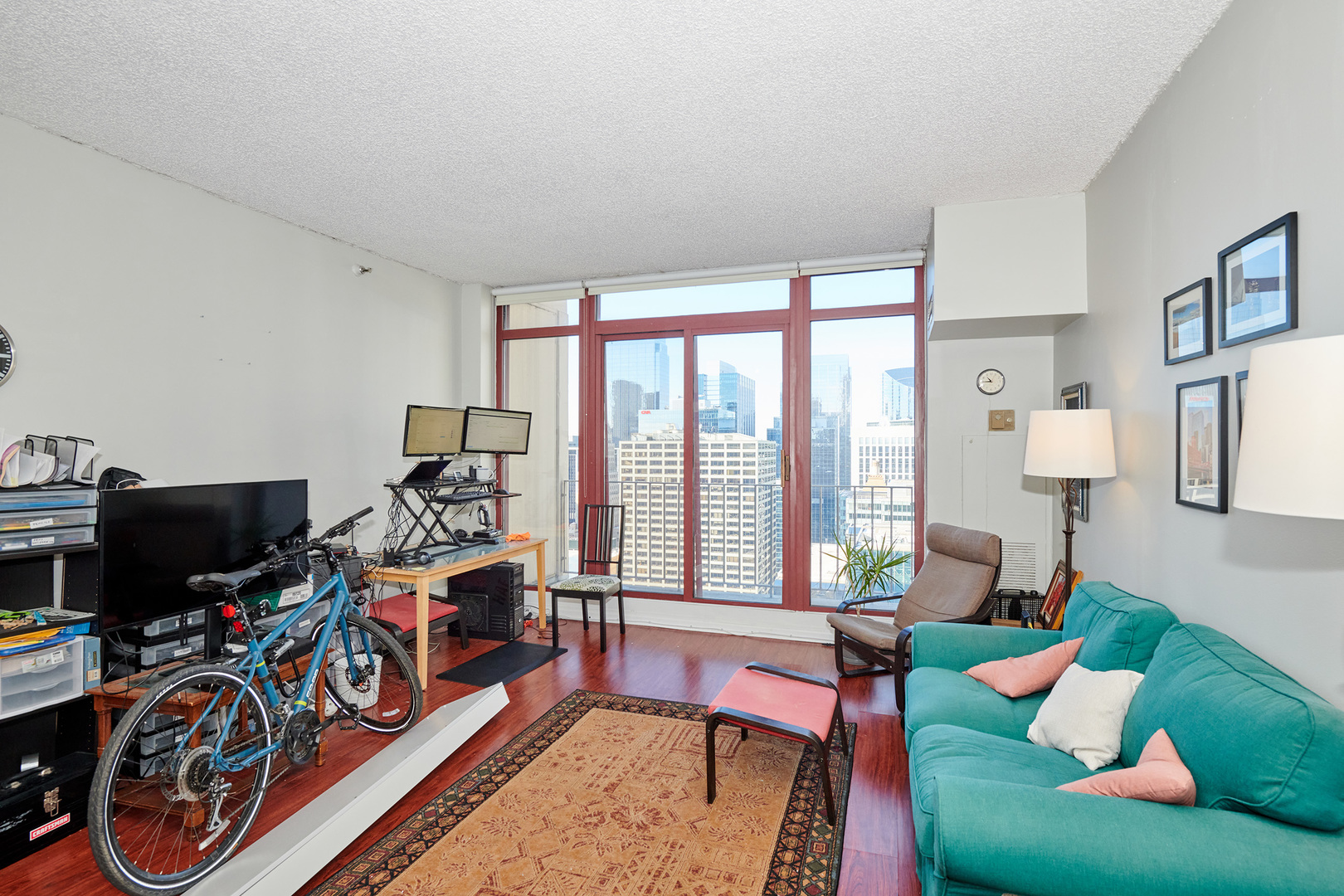 200 North Dearborn Street, Unit 4608 Chicago, IL 60601 - Photo 6 of 26 a living room with furniture a rug and a flat screen tv