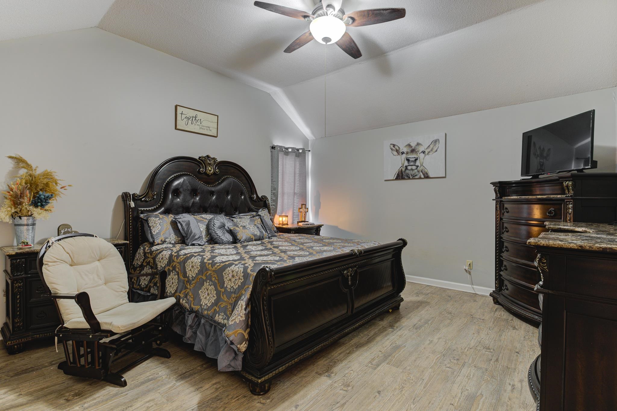 1673 Ranmar Drive Memphis, TN 38016 - Photo 12 of 16 a bedroom with a bed and a television