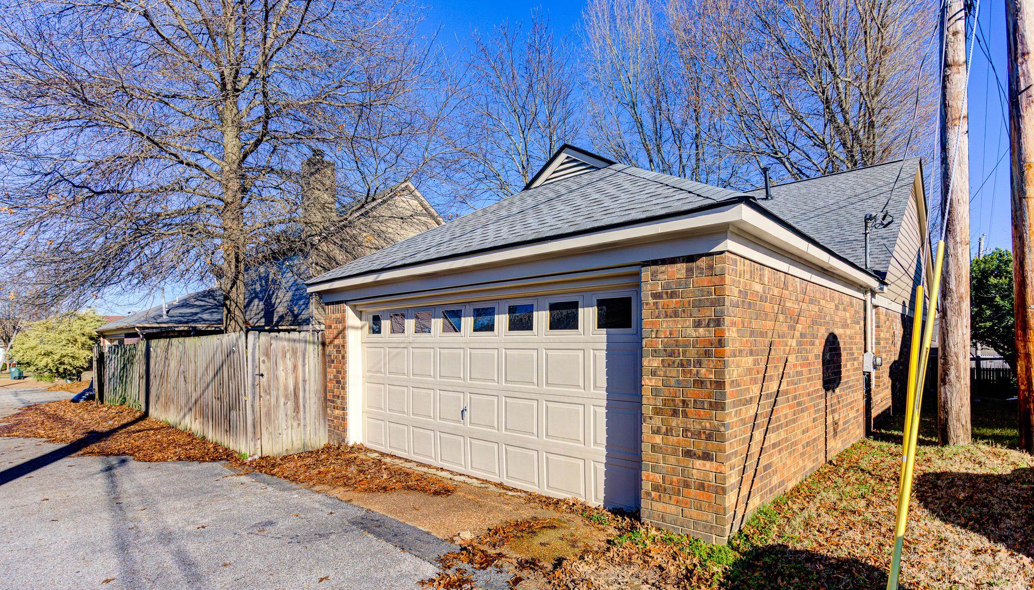 1673 Ranmar Drive Memphis, TN 38016 - Photo 16 of 16 a front view of a house with a garage