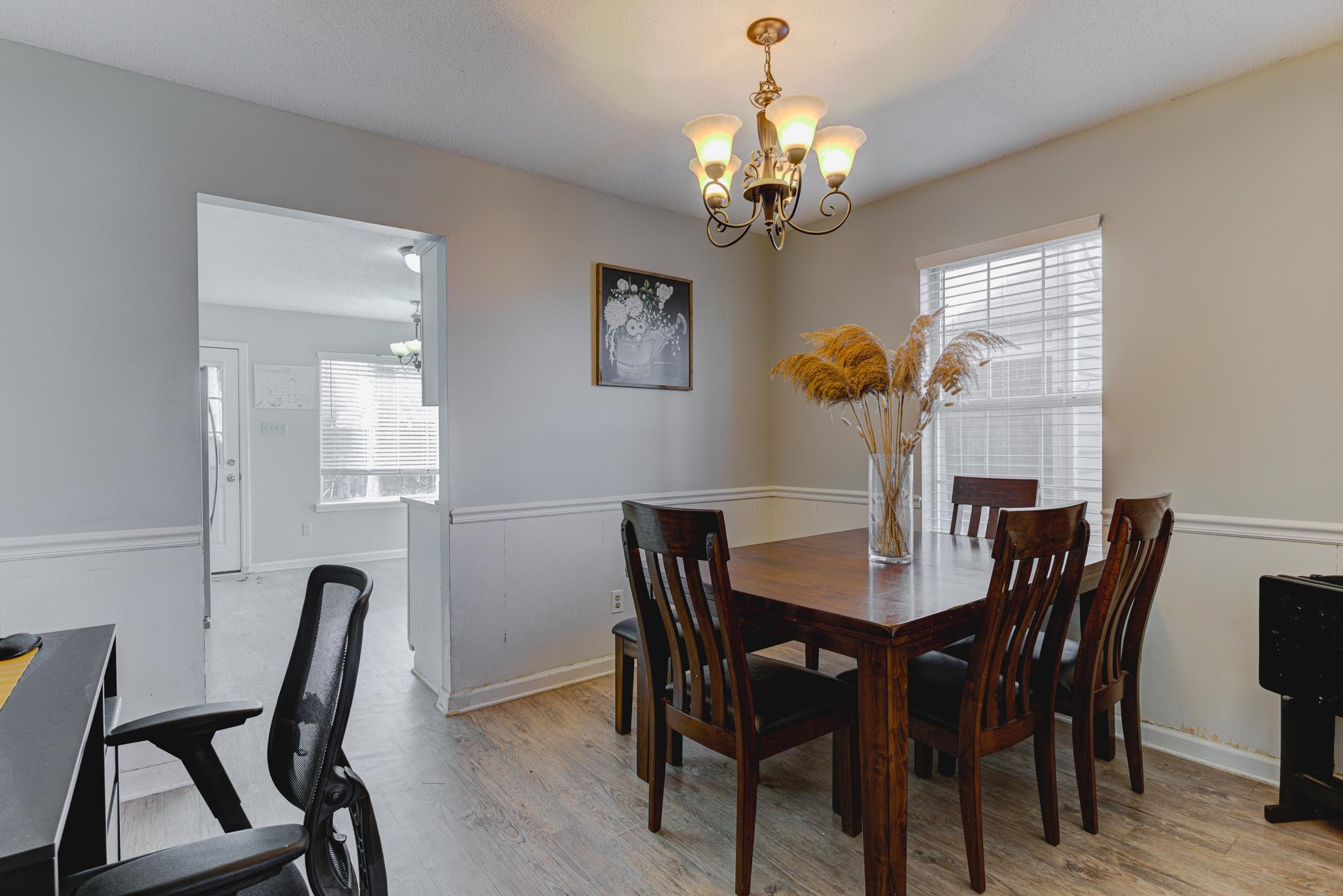 1673 Ranmar Drive Memphis, TN 38016 - Photo 5 of 16 a view of a dining room with furniture and chandelier