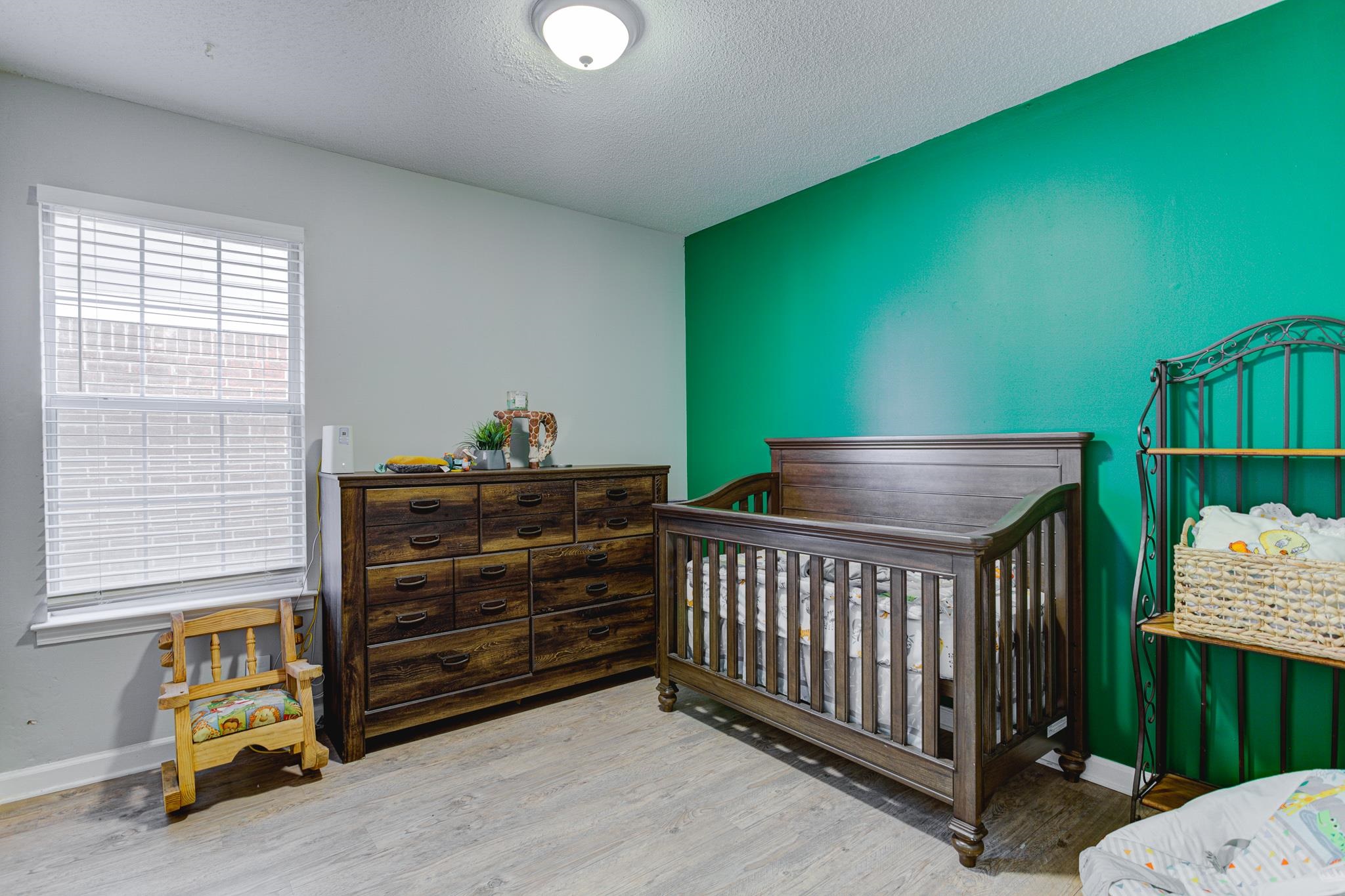 1673 Ranmar Drive Memphis, TN 38016 - Photo 10 of 16 a bedroom with a bed and a window