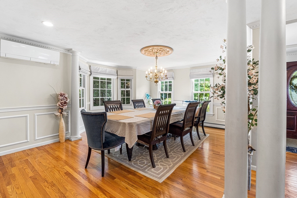 1 Jonathans Way Upton, MA 01568 - Photo 15 of 42 a view of a dining room with furniture and wooden floor
