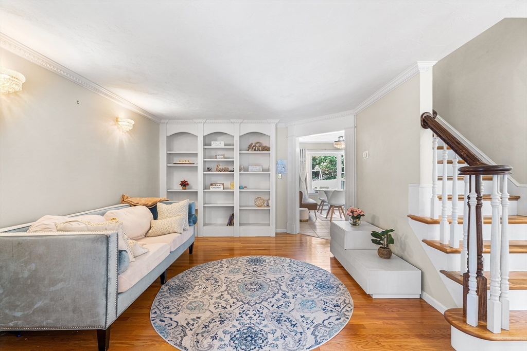 1 Jonathans Way Upton, MA 01568 - Photo 18 of 42 a living room with furniture rug and wooden floor