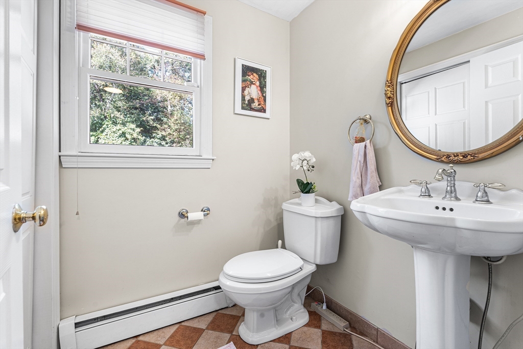 1 Jonathans Way Upton, MA 01568 - Photo 19 of 42 a bathroom with a toilet a sink and a mirror