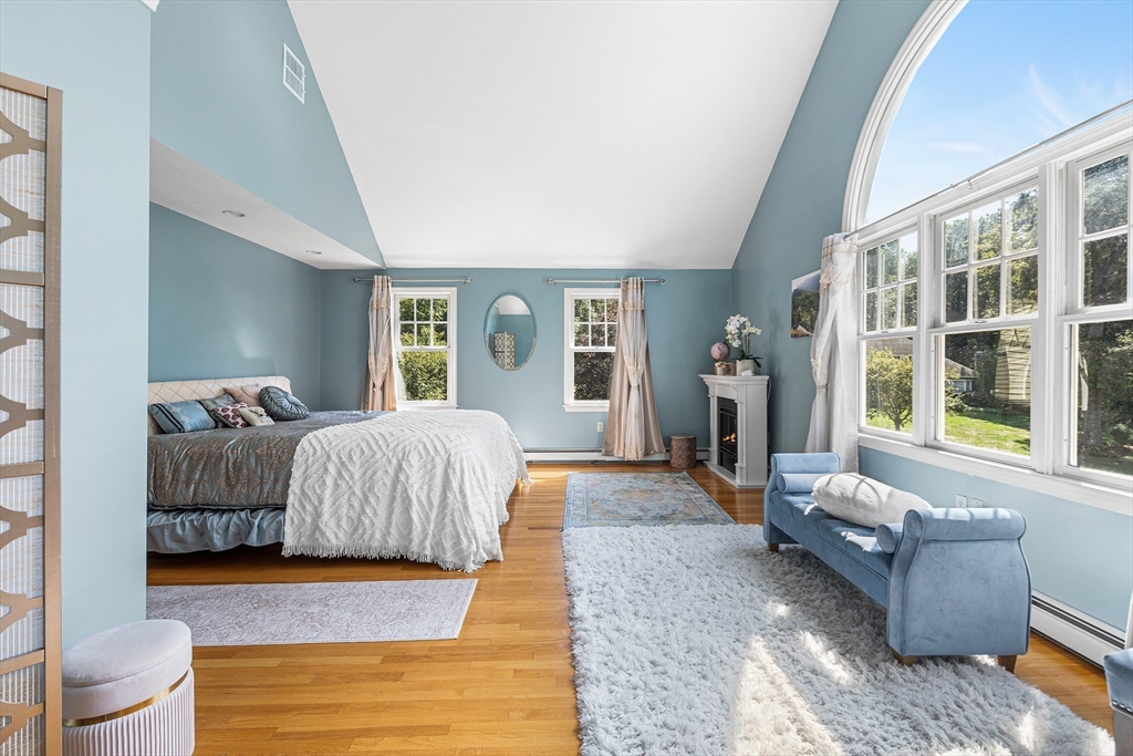 1 Jonathans Way Upton, MA 01568 - Photo 20 of 42 a bedroom with a large bed couch and a window