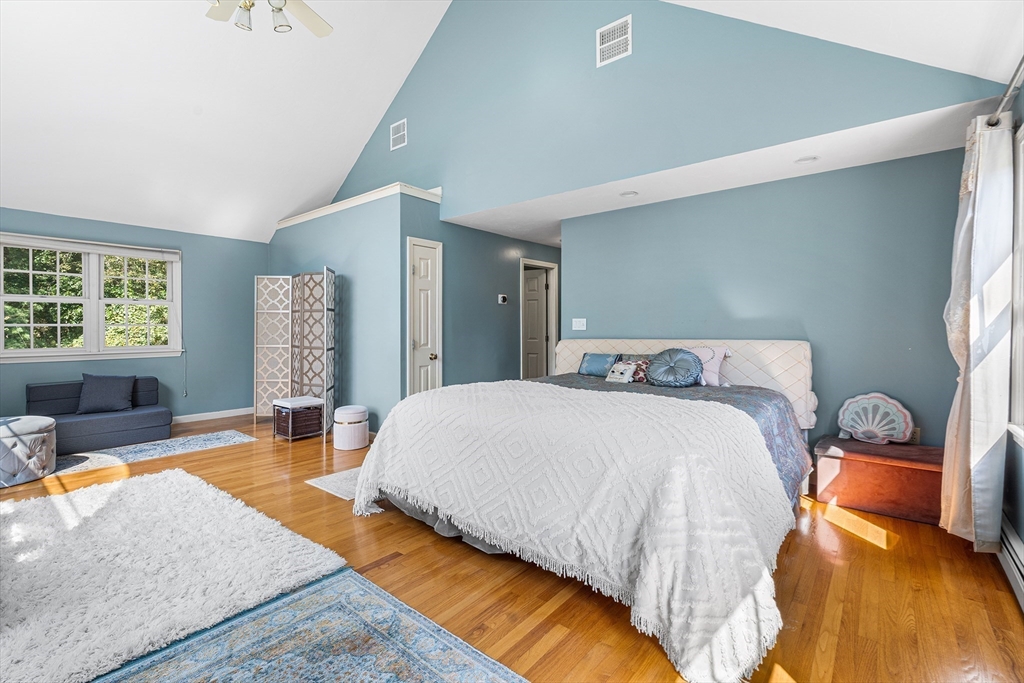 1 Jonathans Way Upton, MA 01568 - Photo 22 of 42 a spacious bedroom with a bed and a couch