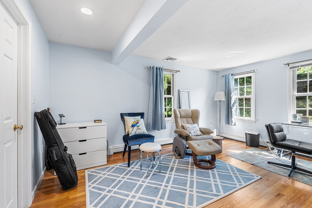 1 Jonathans Way Upton, MA 01568 - Photo 29 of 42 a living room with furniture a rug and a window