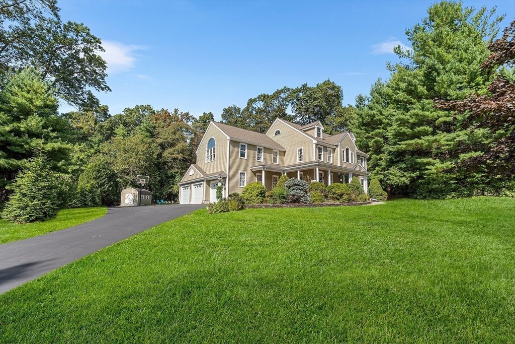 1 Jonathans Way Upton, MA 01568 - Photo 38 of 42 a front view of a house with a yard