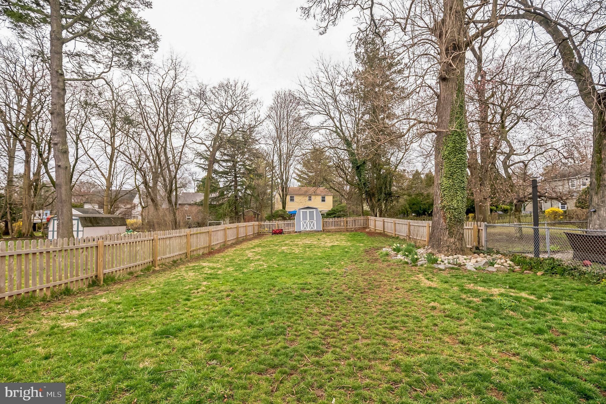 311 Highland Road Cheltenham, PA 19012 - Photo 23 of 27 Spacious, fenced-in backyard.