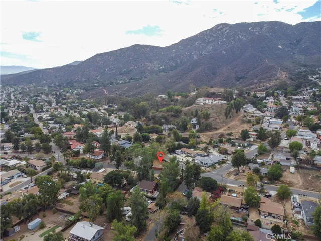 an aerial view of residential house and green space