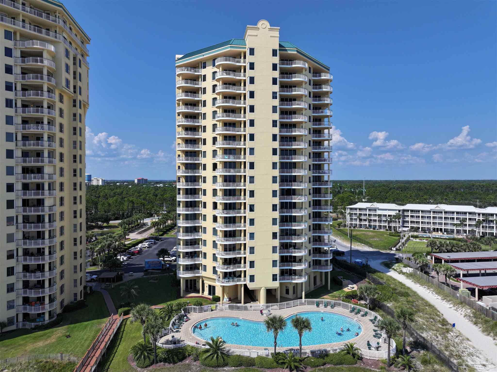 13597 Perdido Key Drive, Unit E12C Pensacola, FL 32507 - Photo 1 of 43 a view of a city with tall buildings