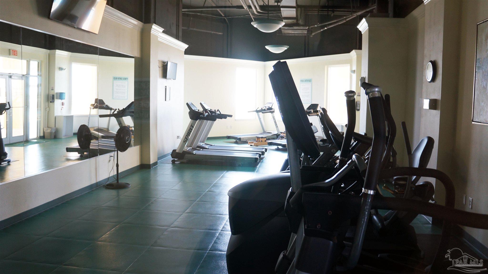13597 Perdido Key Drive, Unit E12C Pensacola, FL 32507 - Photo 15 of 43 a view of a room with gym equipment