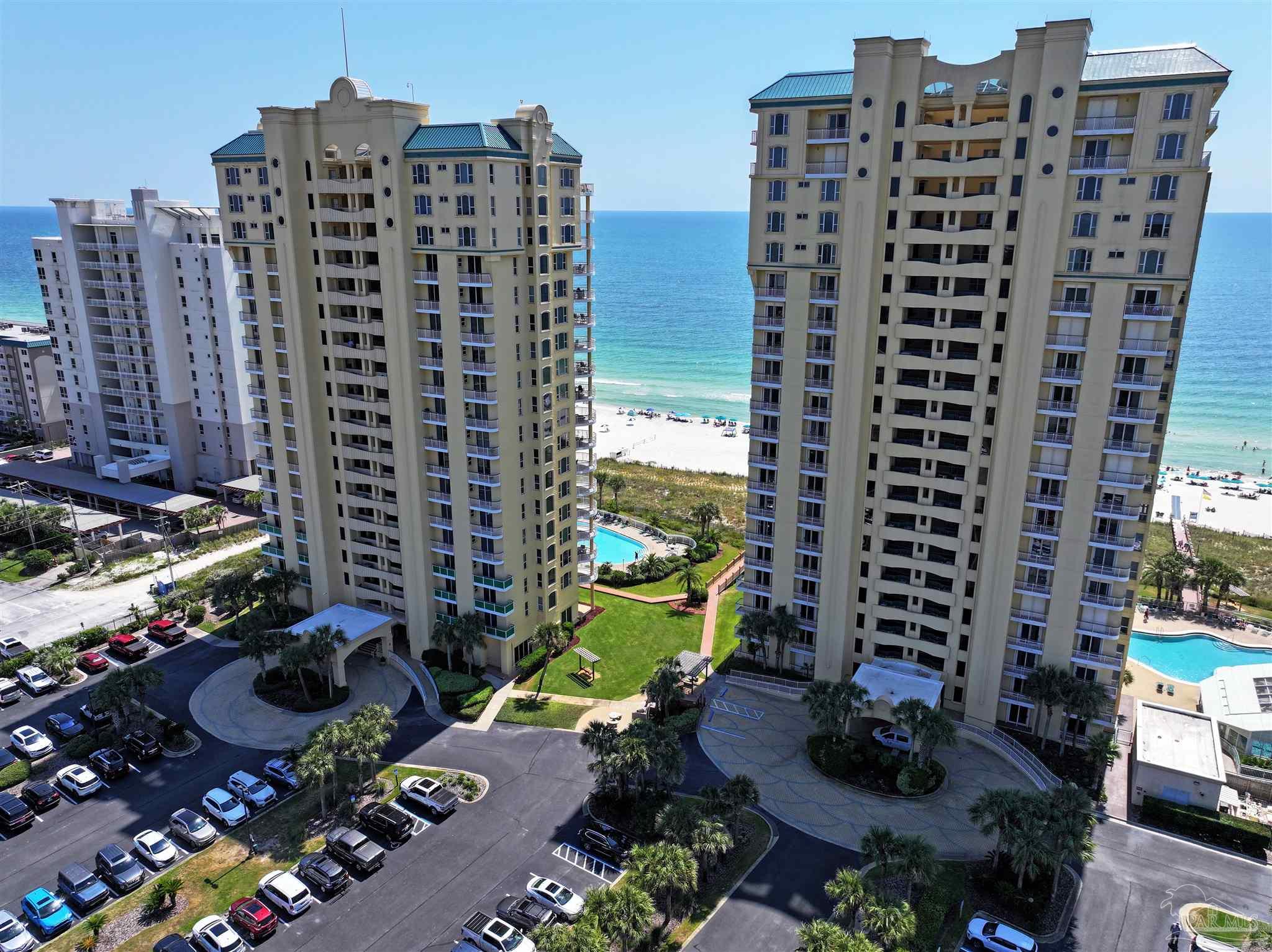 13597 Perdido Key Drive, Unit E12C Pensacola, FL 32507 - Photo 2 of 43 a view of a city with tall buildings