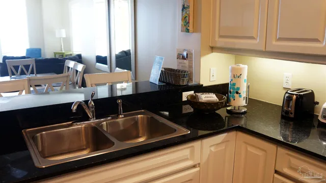 a bedroom with a bed and hallway