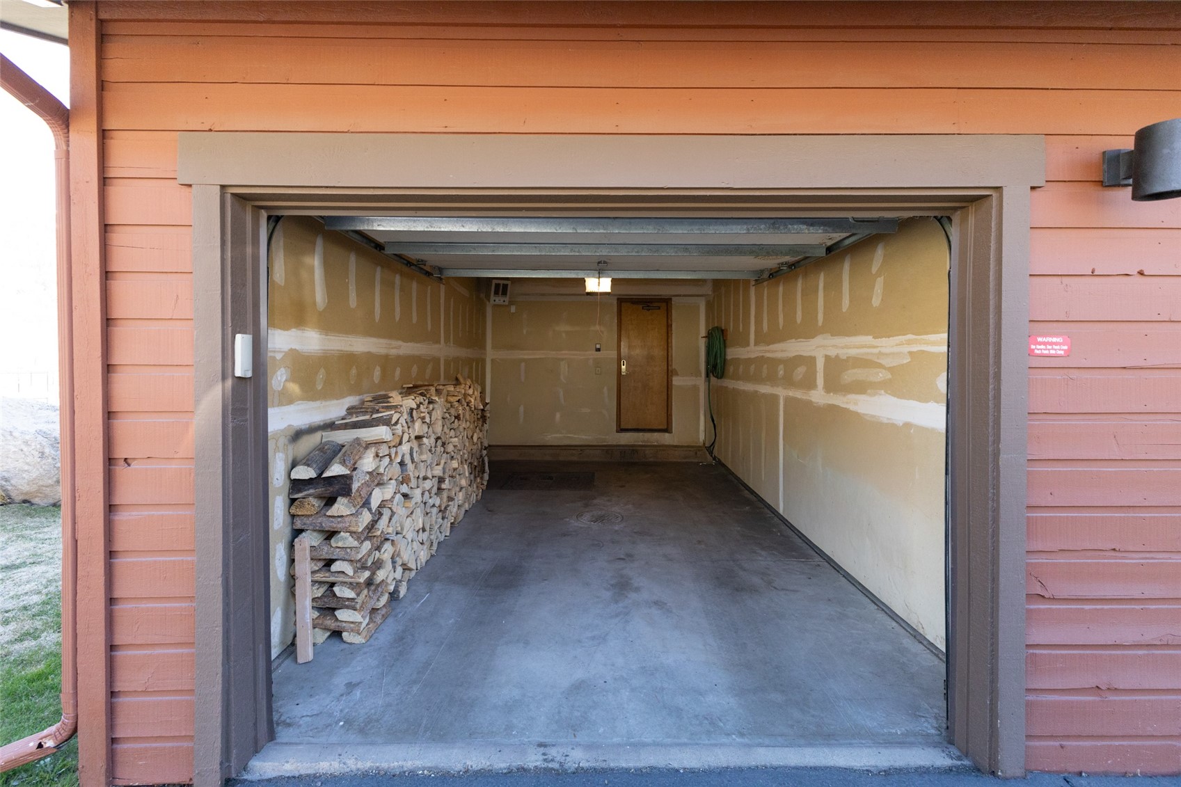 1765 Ranch Road, Unit 601 Steamboat Springs, CO 80487 - Photo 28 of 38 1 Car Garage - Firewood Provided by HOA