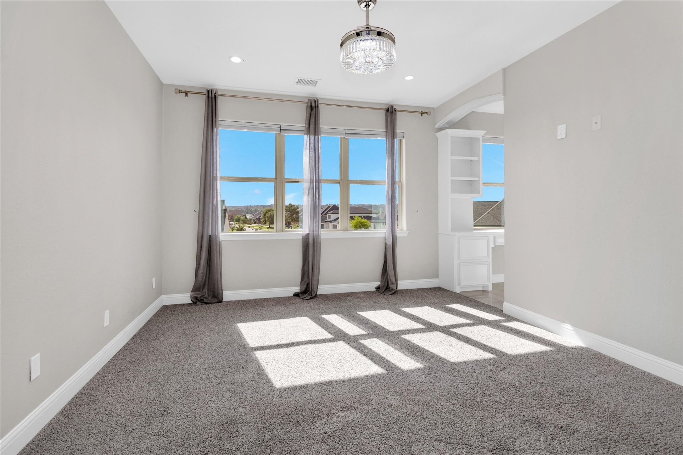 10887 Decatur Street Willis, TX 77318 - Photo 34 of 50 This light-filled bedroom with clean lines, plush carpet and a well-sized layout that’s easy to furnish and make your own including it's very own home office space.