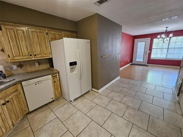 a view of a livingroom with wooden floor
