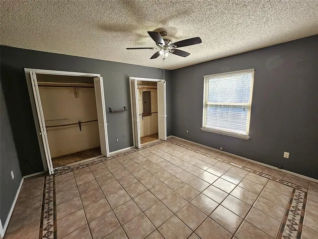 a bathroom with a sink mirror and vanity
