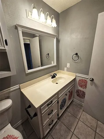 a view of a room with rack on the wall