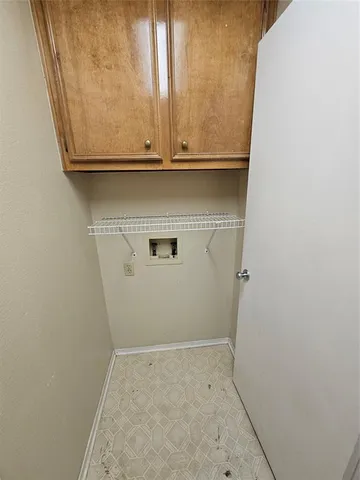 a view of a house with a yard and tree s