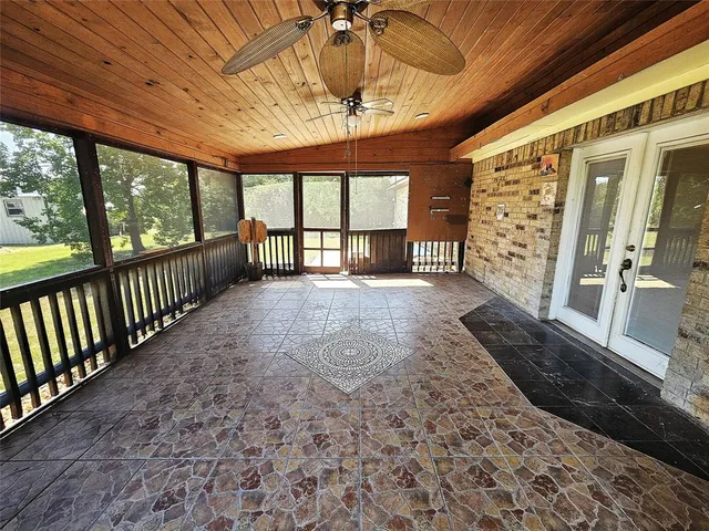 a large room with large windows