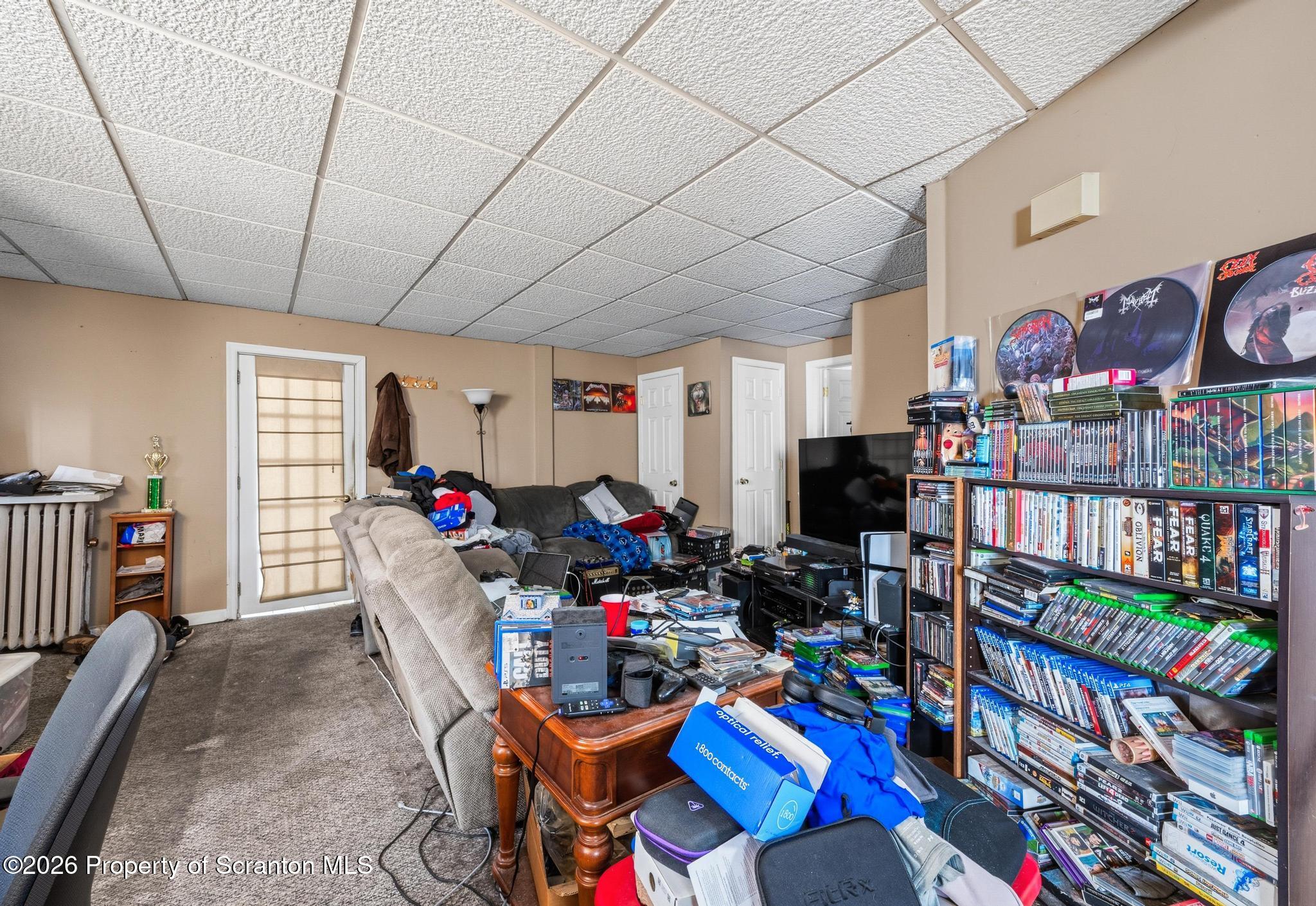 518 Prospect Avenue Scranton, PA 18505 - Photo 39 of 59 a living room with lots of furniture and toys