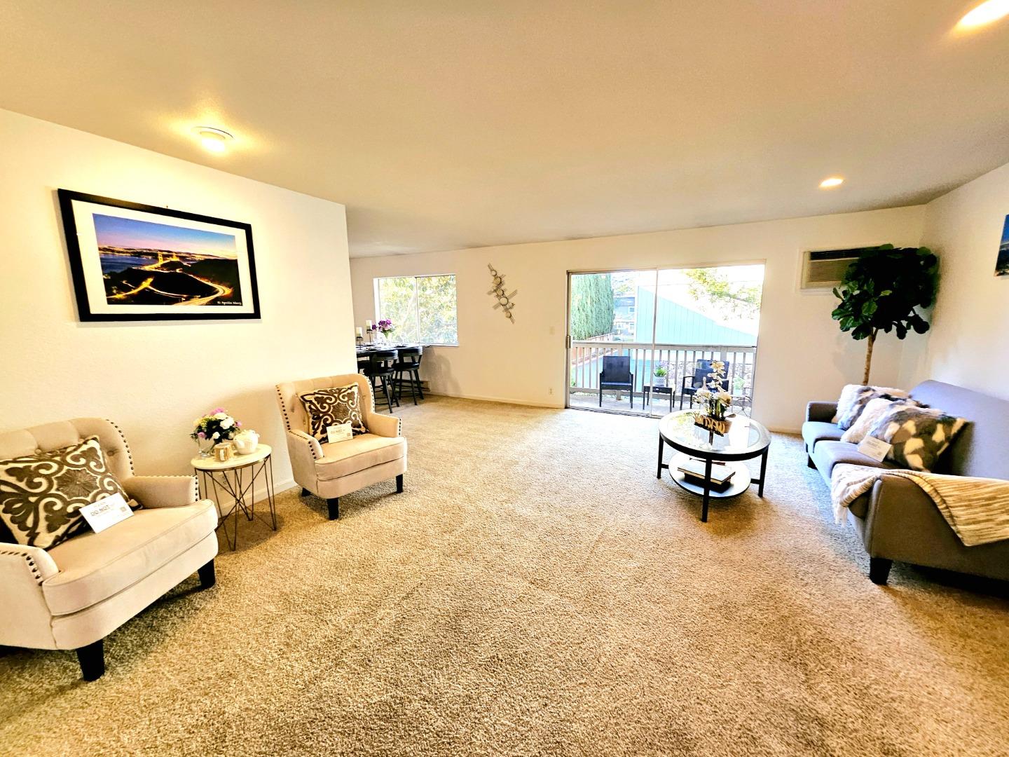 a living room with furniture and a couch