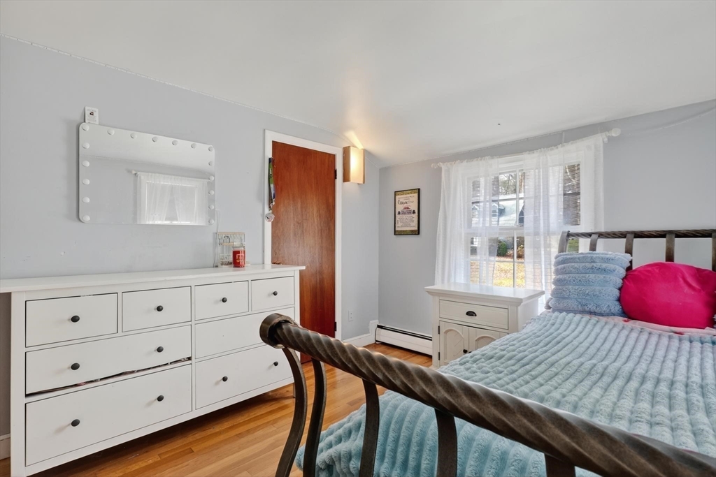 21 Fairbanks Road Chelmsford, MA 01824 - Photo 19 of 29 a bed room with a bed and a dresser