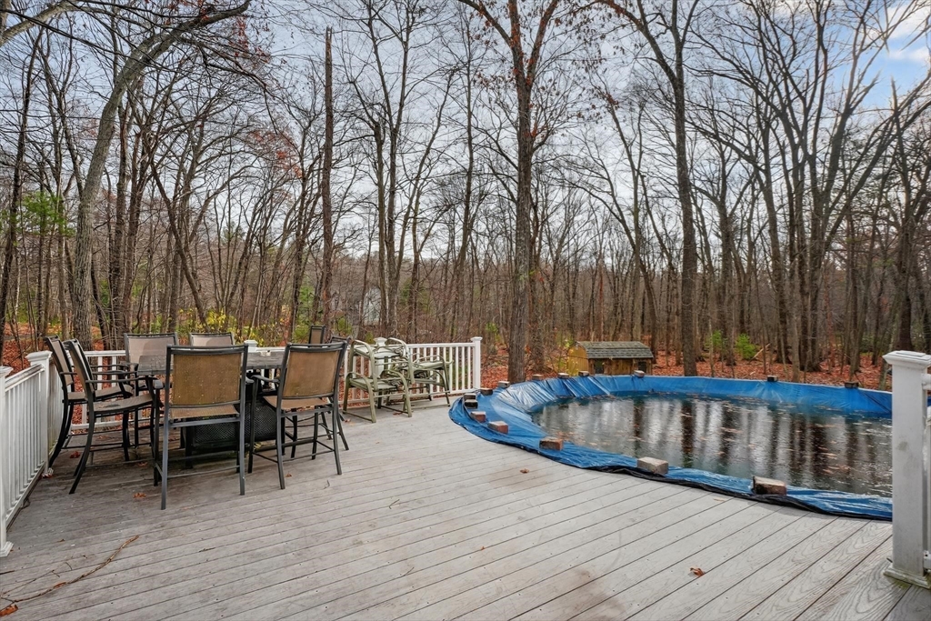 21 Fairbanks Road Chelmsford, MA 01824 - Photo 26 of 29 a view of backyard with seating space and trees