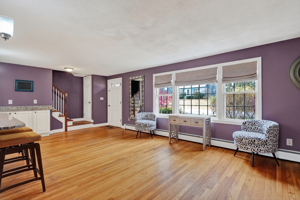 21 Fairbanks Road Chelmsford, MA 01824 - Photo 5 of 29 a living room with furniture and wooden floor
