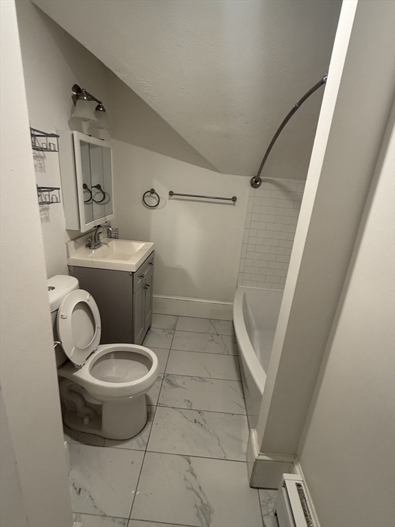 42 Mott Street, Unit 3 Fall River, MA 02721 - Photo 5 of 13 a bathroom with a sink and mirror