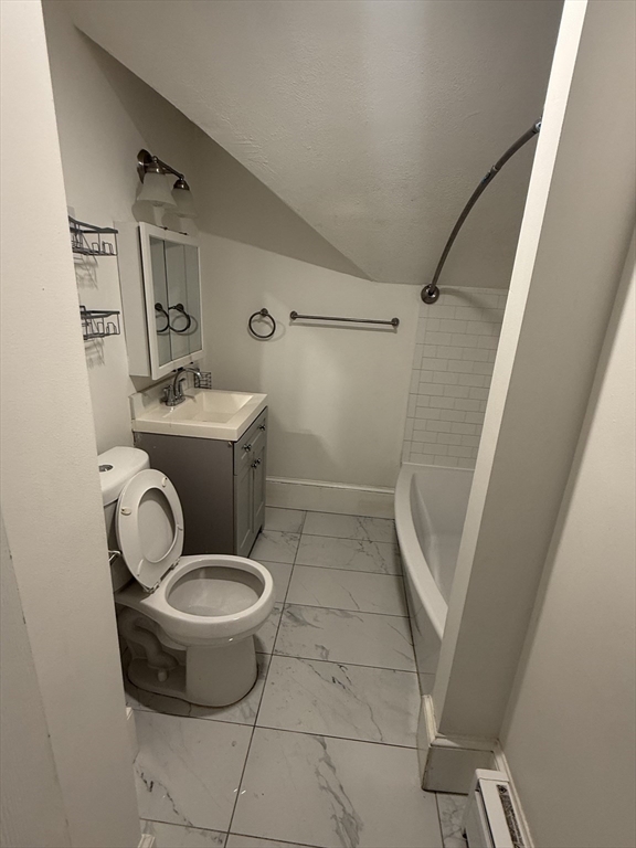 42 Mott Street, Unit 3 Fall River, MA 02721 - Photo 6 of 13 a bathroom with a sink toilet and shower