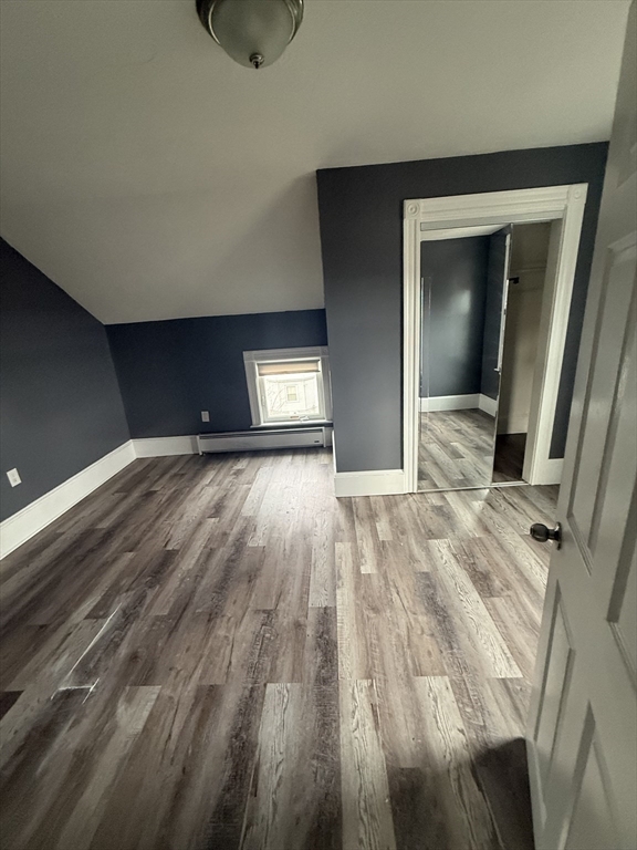 42 Mott Street, Unit 3 Fall River, MA 02721 - Photo 8 of 13 a view of an empty room and wooden floor