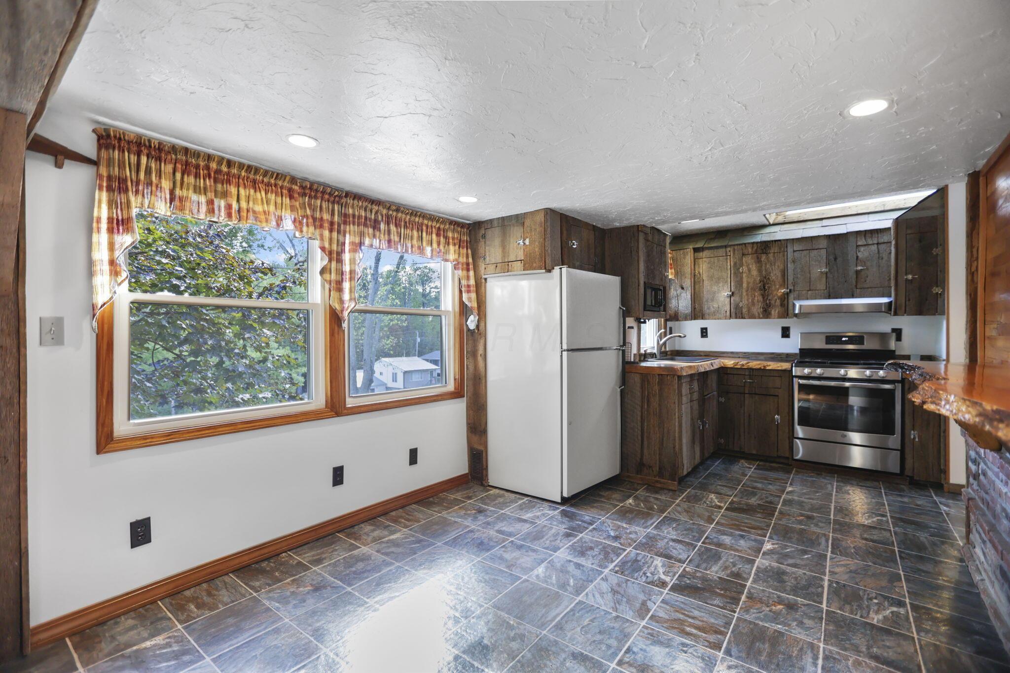 23368 Lashley Road Senecaville, OH 43780 - Photo 8 of 37 Kitchen with Eating Space