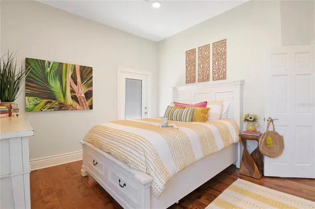 a spacious bathroom with 2 sink tub and a mirror