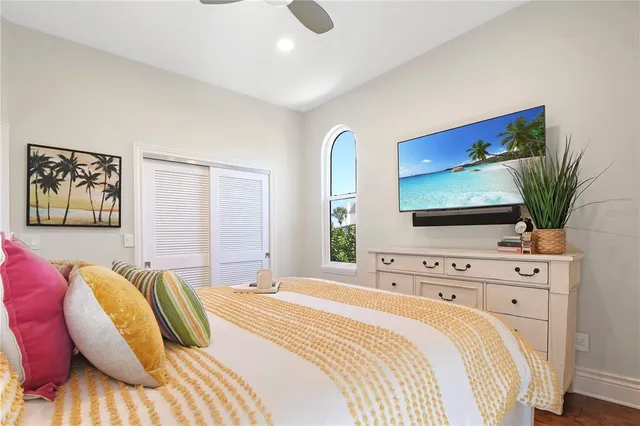 a white bath tub sitting next to a white sink