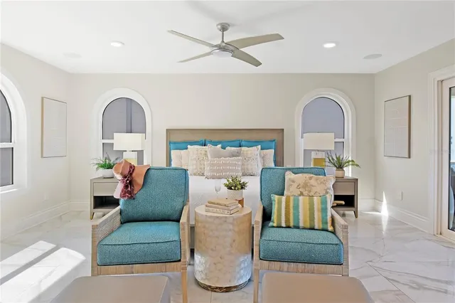 a view of empty room with stairs and a window