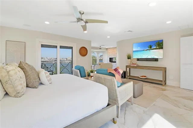 a view of a deck with a dining table and chairs
