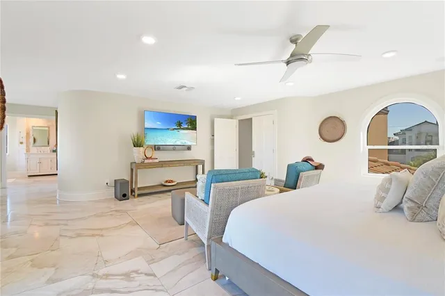 a view of a chair and table in the balcony