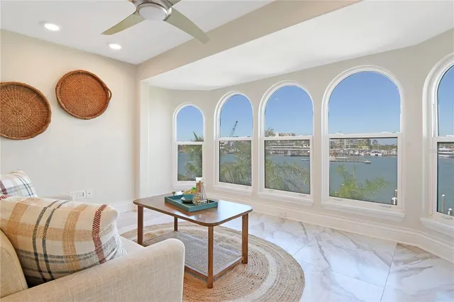 a bathroom with a sink mirror and toilet