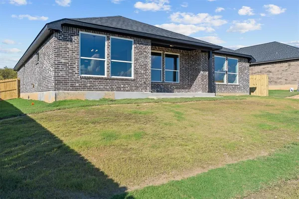 a view of a house with a swimming pool