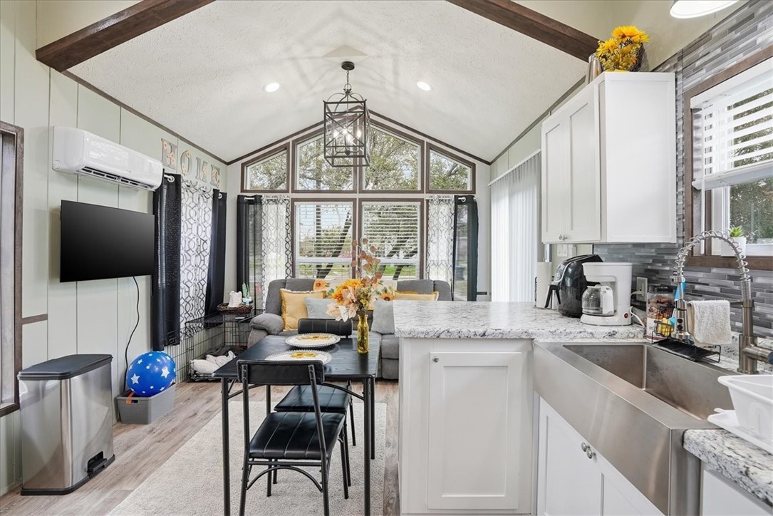 Undisclosed Address Rockport, TX 78382 - Photo 12 of 24 a kitchen that has a lot of cabinets in it and appliances