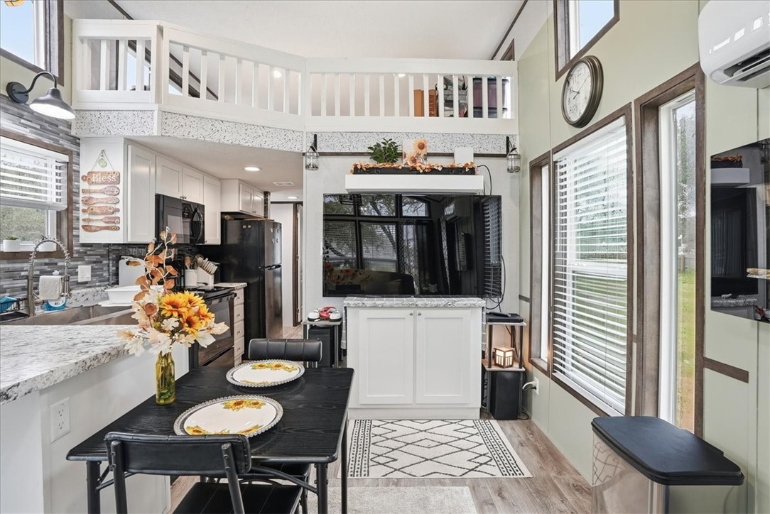 Undisclosed Address Rockport, TX 78382 - Photo 13 of 24 a dining room with furniture and window