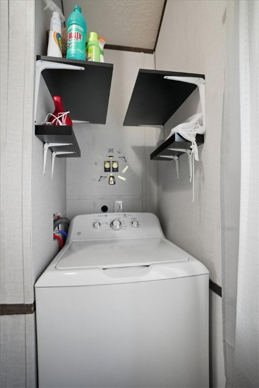 Undisclosed Address Rockport, TX 78382 - Photo 17 of 24 a utility room with dryer and washer