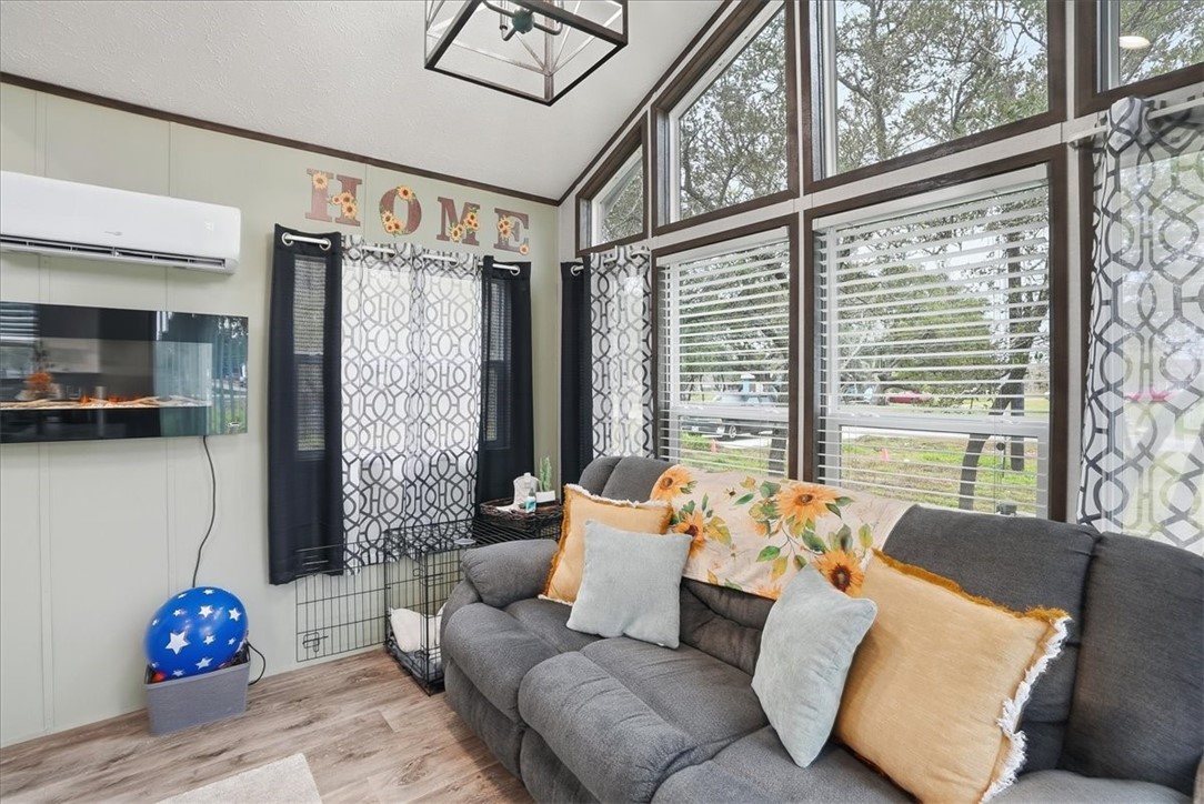 Undisclosed Address Rockport, TX 78382 - Photo 7 of 24 a living room with furniture and a large window