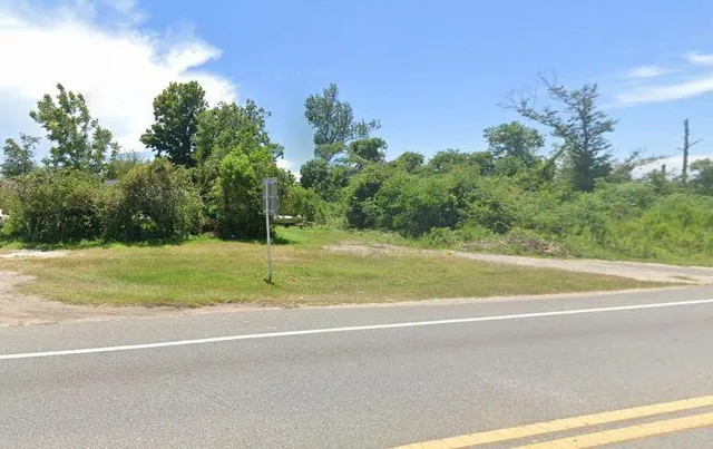 a view of a house with a big yard