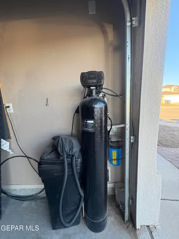 a view of a hallway with seating area