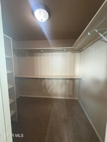 a view of a room with racks on the wall