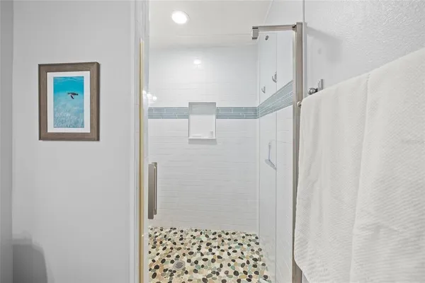 a living room with a bed furniture and a window