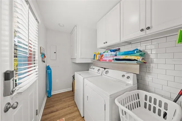 a house with trees in the background